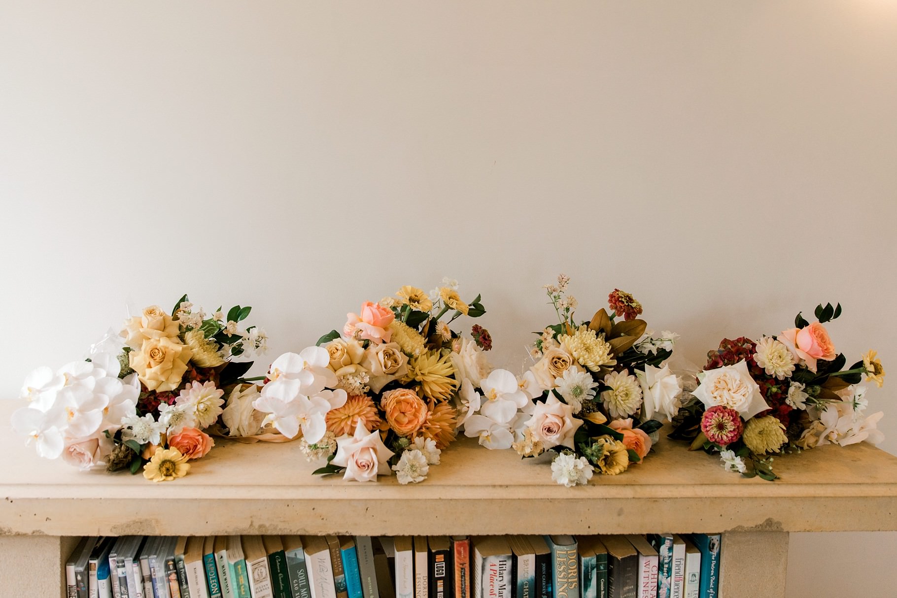 Auckland Wedding photographer, Officers Mess wedding photographer, Takapuna wedding photographer, Floral Stylist, Floral arch, blush bridesmaids dresses, rainy wedding