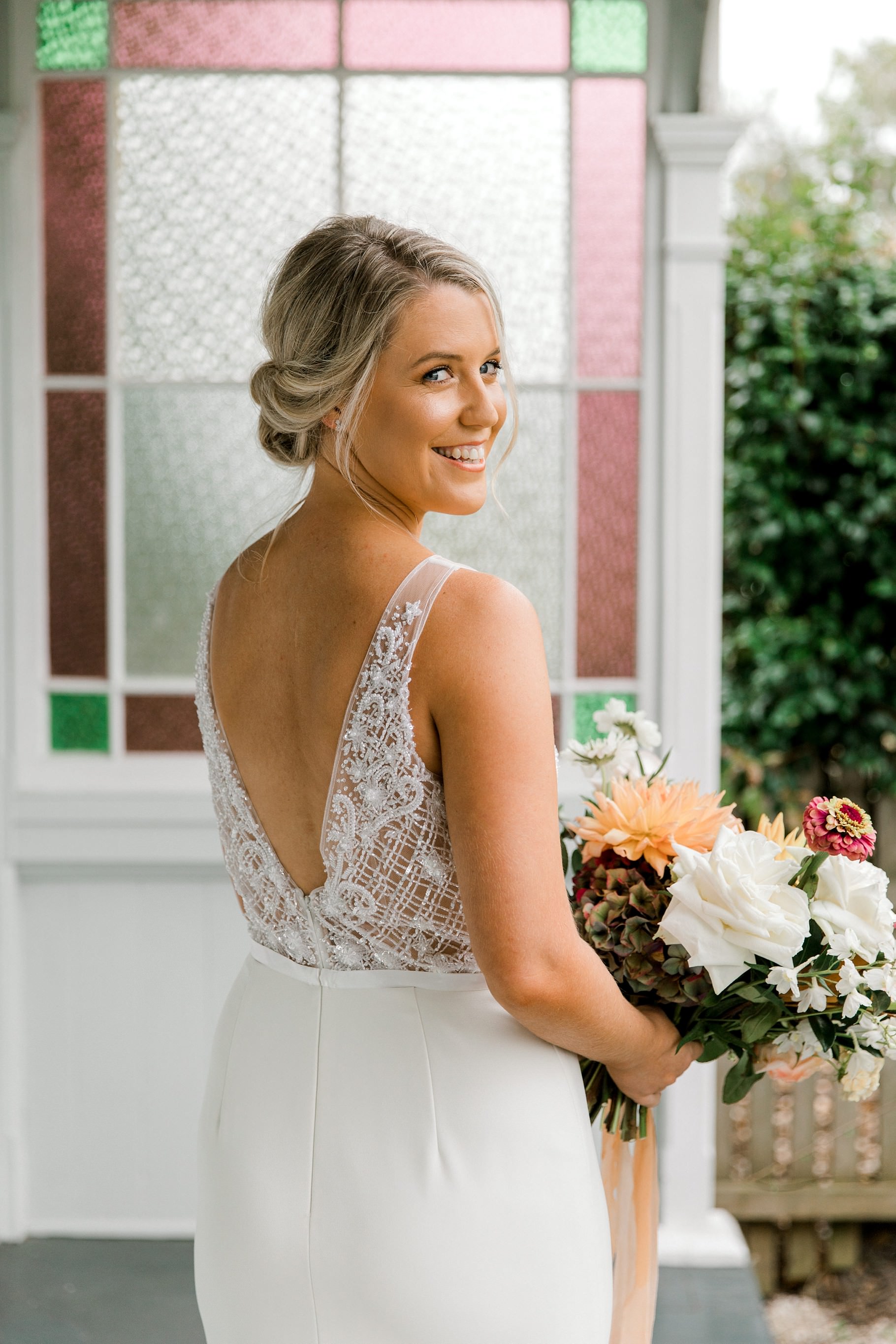 Auckland Wedding photographer, Officers Mess wedding photographer, Takapuna wedding photographer, Floral Stylist, Floral arch, blush bridesmaids dresses, rainy wedding