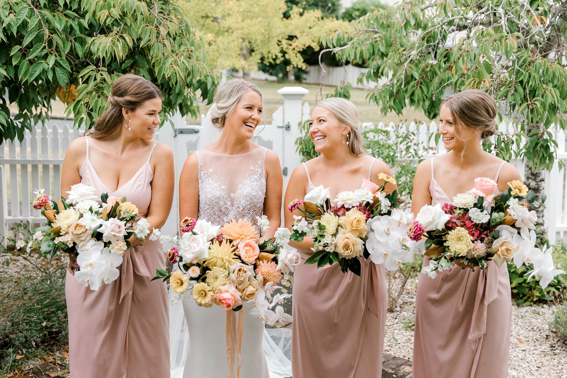 Auckland Wedding photographer, Officers Mess wedding photographer, Takapuna wedding photographer, Floral Stylist, Floral arch, blush bridesmaids dresses, rainy wedding