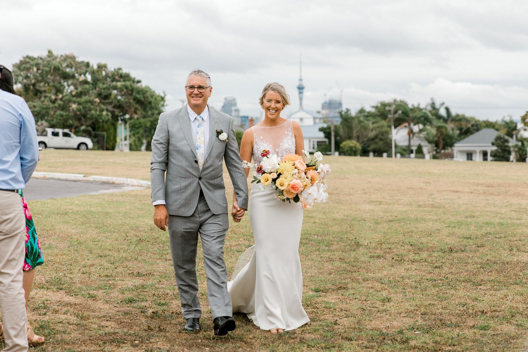 Auckland Wedding photographer, Officers Mess wedding photographer, Takapuna wedding photographer, Floral Stylist, Floral arch, blush bridesmaids dresses, rainy wedding