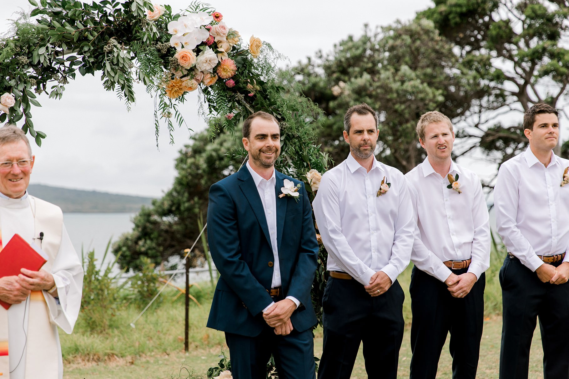 Auckland Wedding photographer, Officers Mess wedding photographer, Takapuna wedding photographer, Floral Stylist, Floral arch, blush bridesmaids dresses, rainy wedding