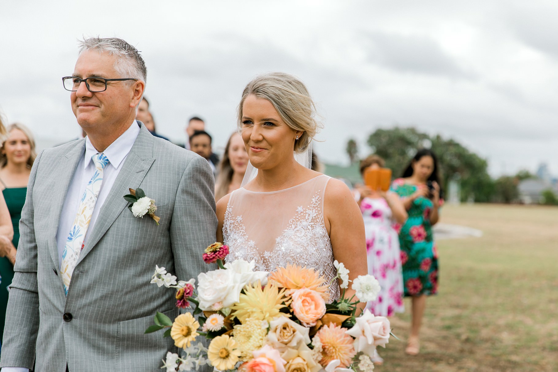 Auckland Wedding photographer, Officers Mess wedding photographer, Takapuna wedding photographer, Floral Stylist, Floral arch, blush bridesmaids dresses, rainy wedding