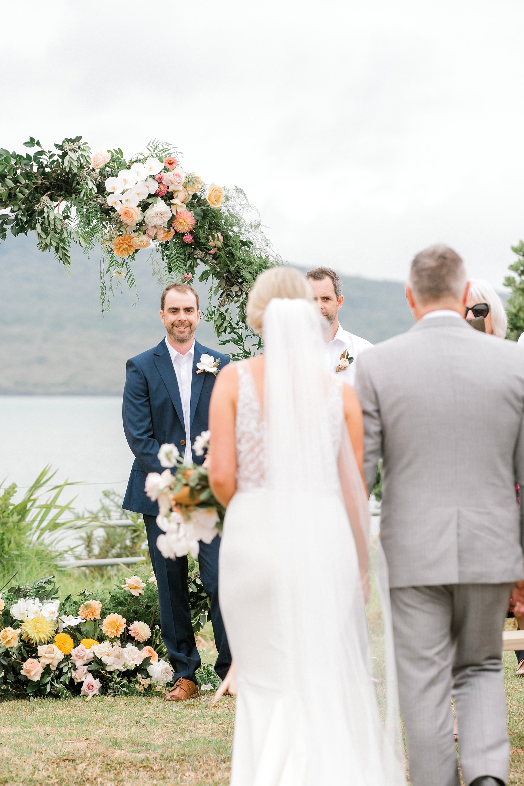 Auckland Wedding photographer, Officers Mess wedding photographer, Takapuna wedding photographer, Floral Stylist, Floral arch, blush bridesmaids dresses, rainy wedding