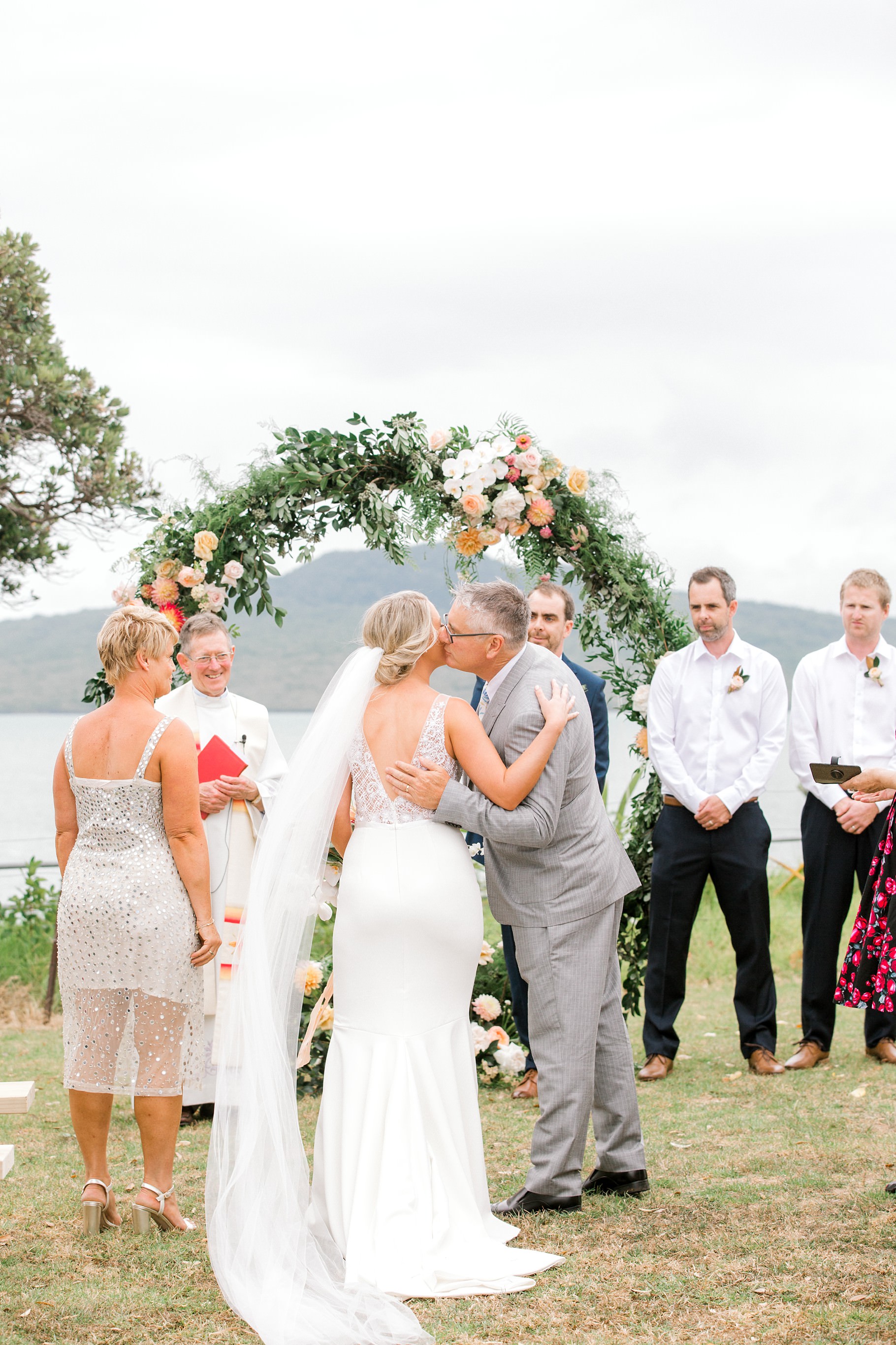 Auckland Wedding photographer, Officers Mess wedding photographer, Takapuna wedding photographer, Floral Stylist, Floral arch, blush bridesmaids dresses, rainy wedding