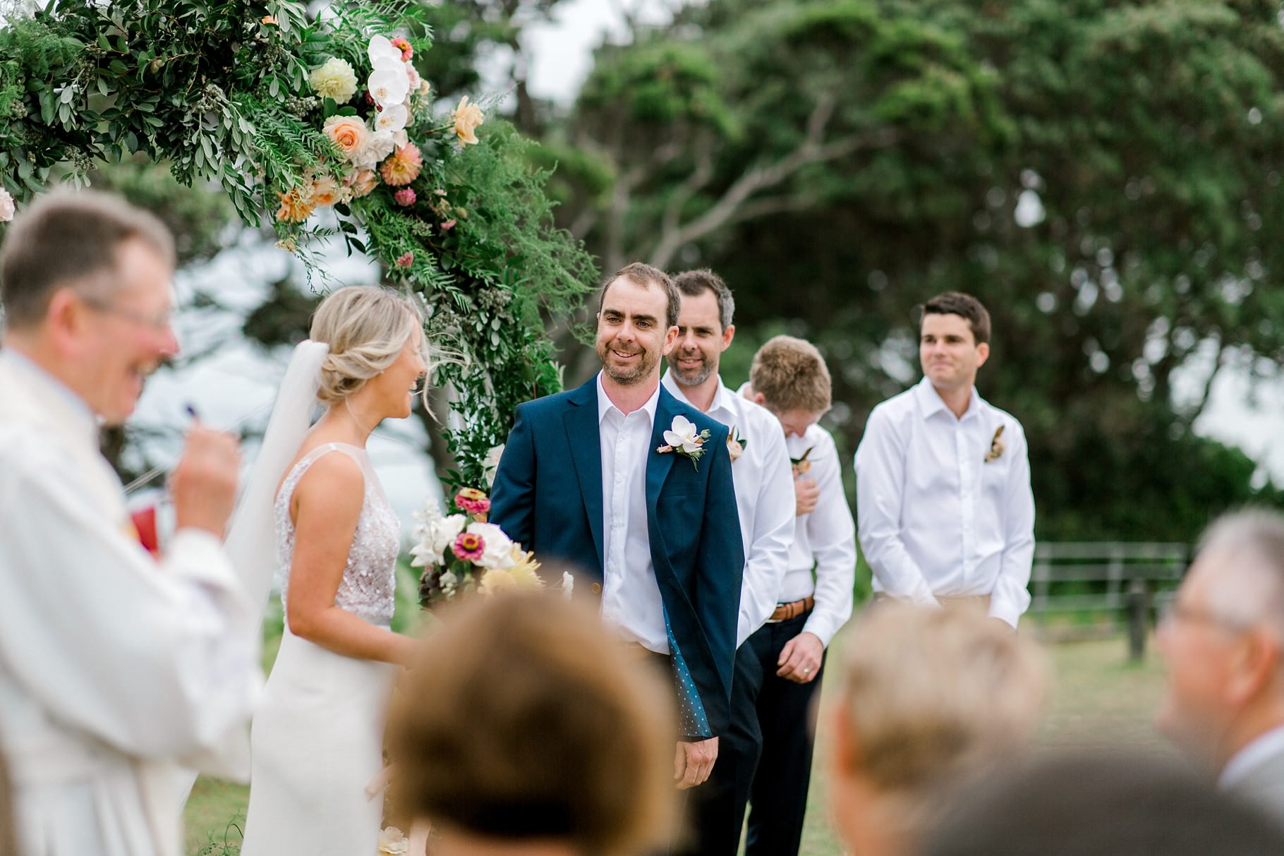 Auckland Wedding photographer, Officers Mess wedding photographer, Takapuna wedding photographer, Floral Stylist, Floral arch, blush bridesmaids dresses, rainy wedding