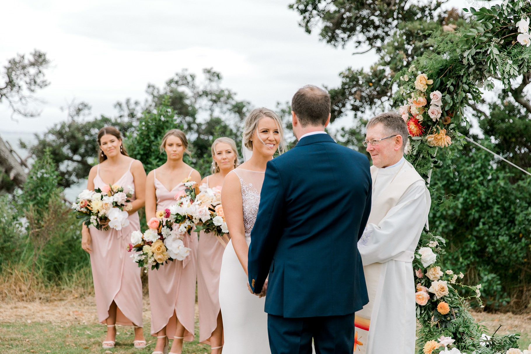 Auckland Wedding photographer, Officers Mess wedding photographer, Takapuna wedding photographer, Floral Stylist, Floral arch, blush bridesmaids dresses, rainy wedding