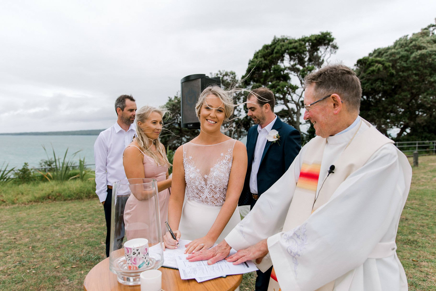 Auckland Wedding photographer, Officers Mess wedding photographer, Takapuna wedding photographer, Floral Stylist, Floral arch, blush bridesmaids dresses, rainy wedding