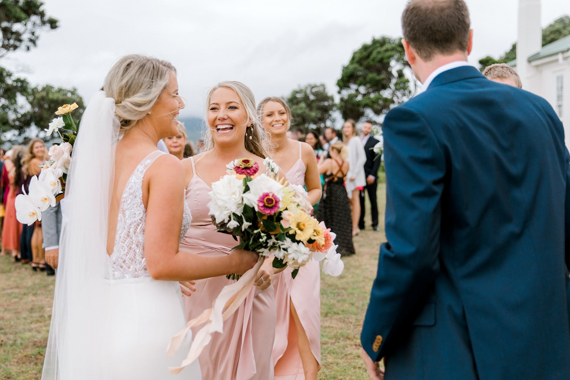 Auckland Wedding photographer, Officers Mess wedding photographer, Takapuna wedding photographer, Floral Stylist, Floral arch, blush bridesmaids dresses, rainy wedding