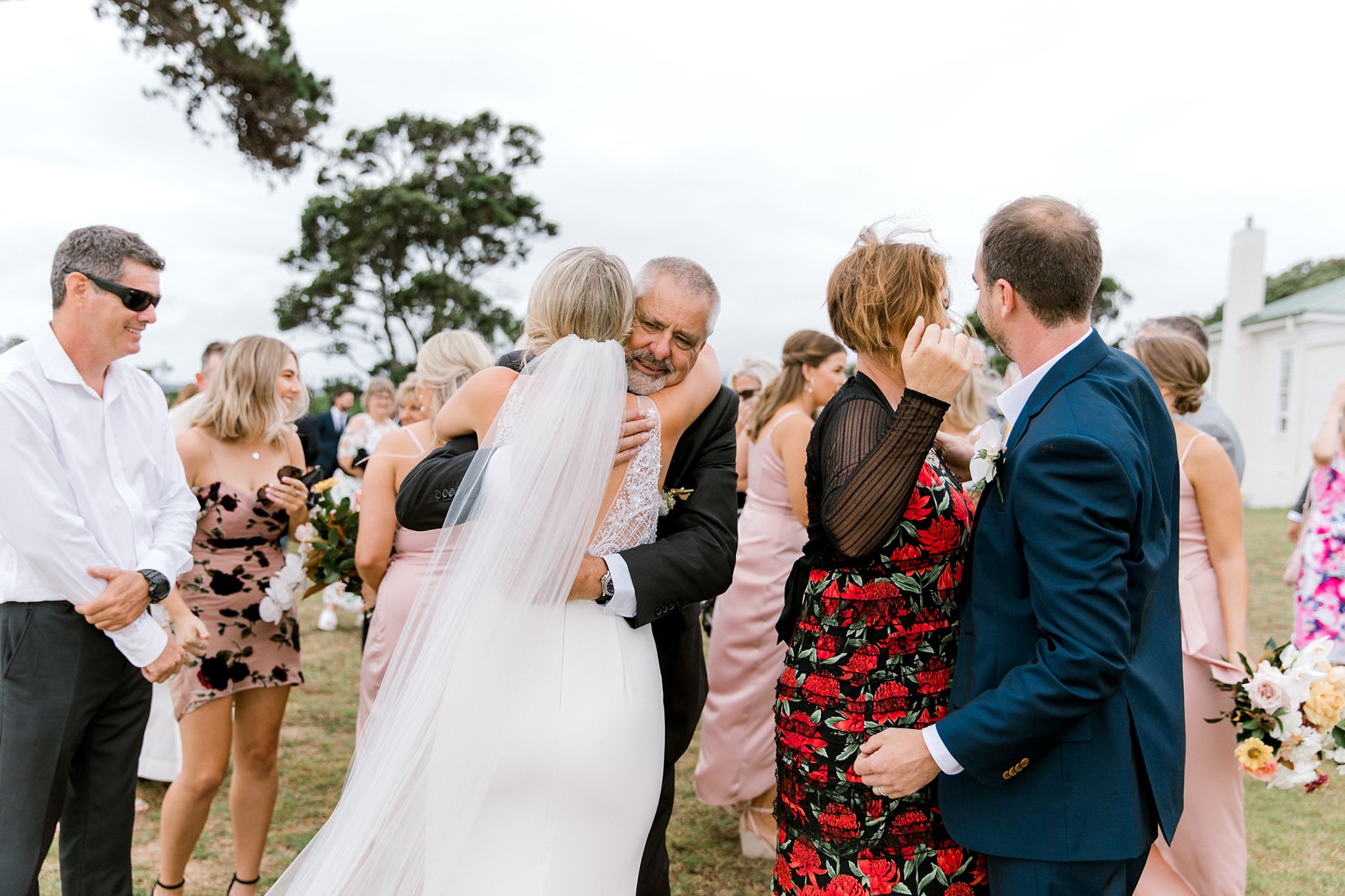 Auckland Wedding photographer, Officers Mess wedding photographer, Takapuna wedding photographer, Floral Stylist, Floral arch, blush bridesmaids dresses, rainy wedding