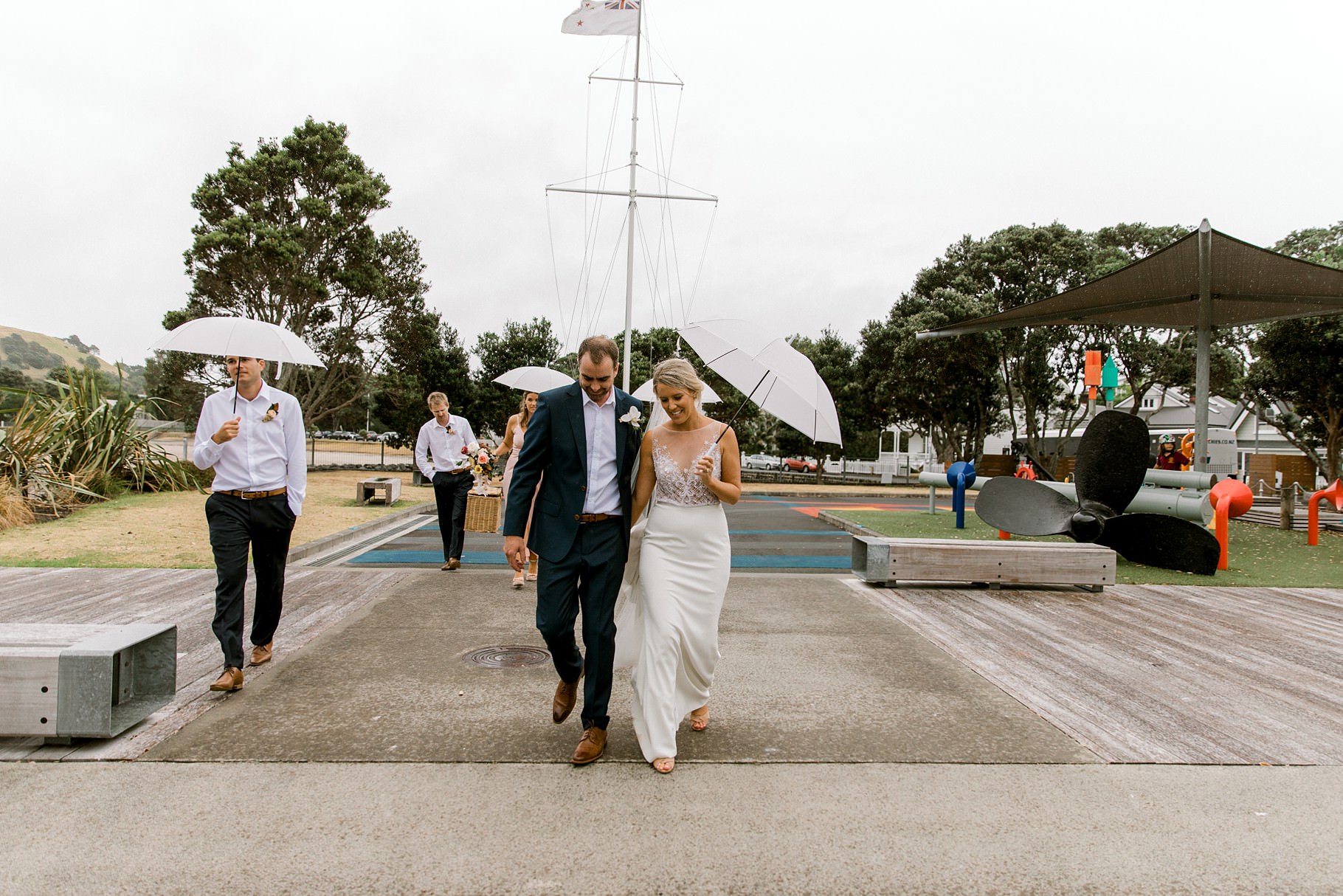 Auckland Wedding photographer, Officers Mess wedding photographer, Takapuna wedding photographer, Floral Stylist, Floral arch, blush bridesmaids dresses, rainy wedding