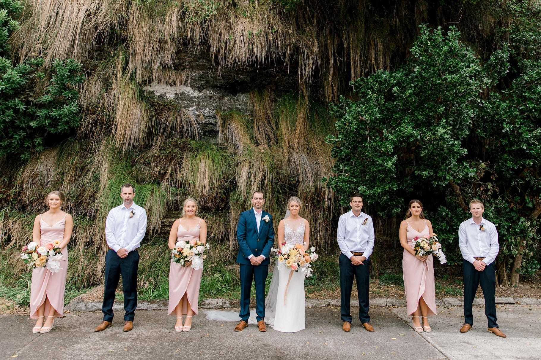 Auckland Wedding photographer, Officers Mess wedding photographer, Takapuna wedding photographer, Floral Stylist, Floral arch, blush bridesmaids dresses, rainy wedding