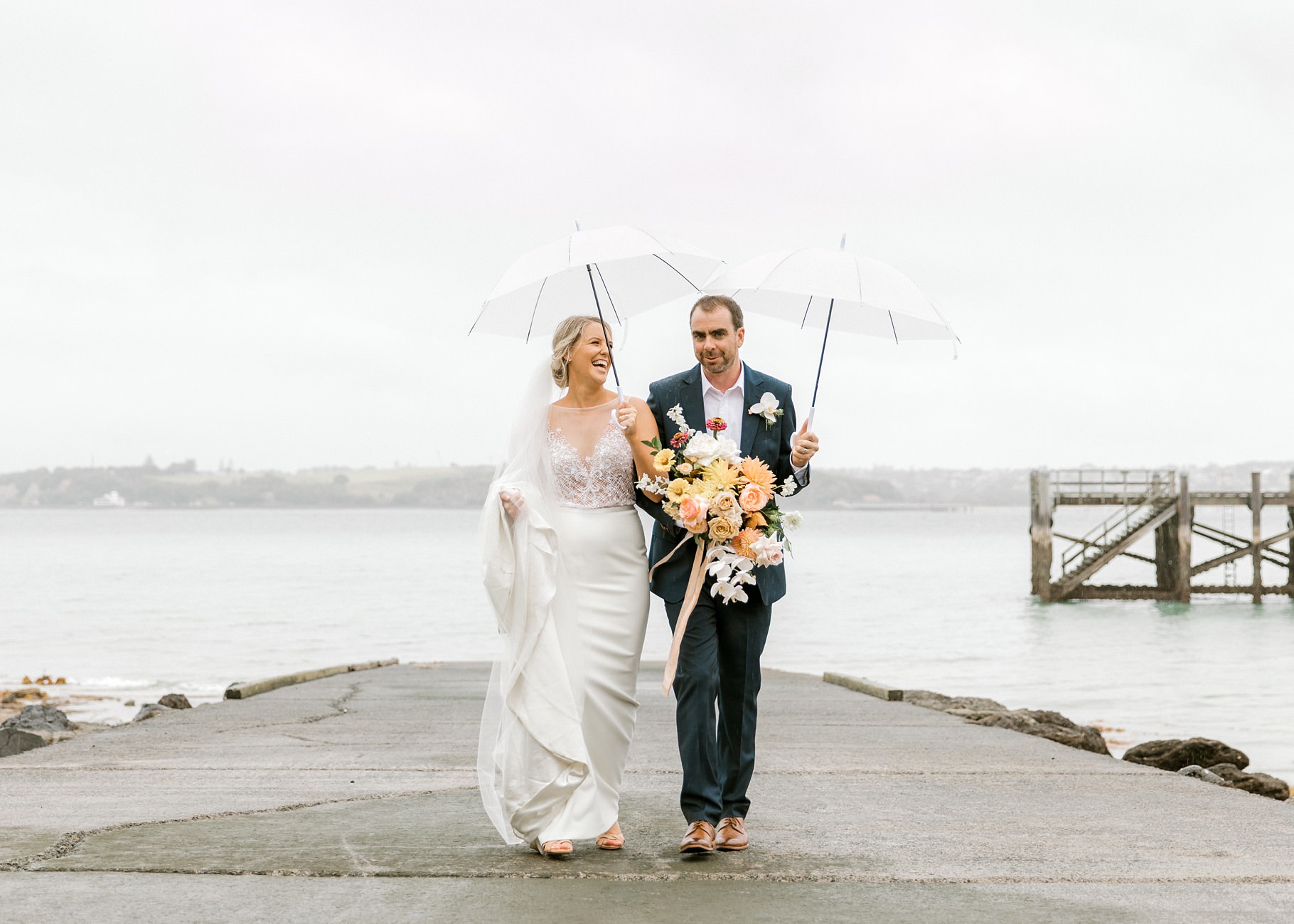 Auckland Wedding photographer, Officers Mess wedding photographer, Takapuna wedding photographer, Floral Stylist, Floral arch, blush bridesmaids dresses, rainy wedding