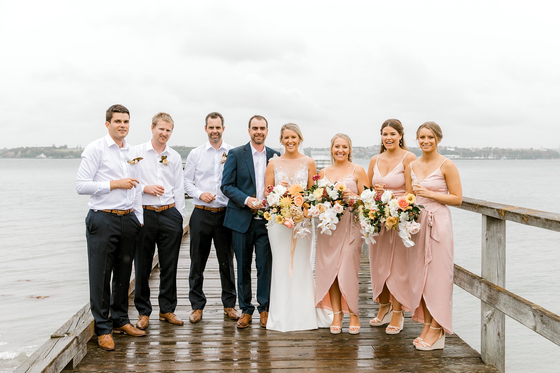 Auckland Wedding photographer, Officers Mess wedding photographer, Takapuna wedding photographer, Floral Stylist, Floral arch, blush bridesmaids dresses, rainy wedding