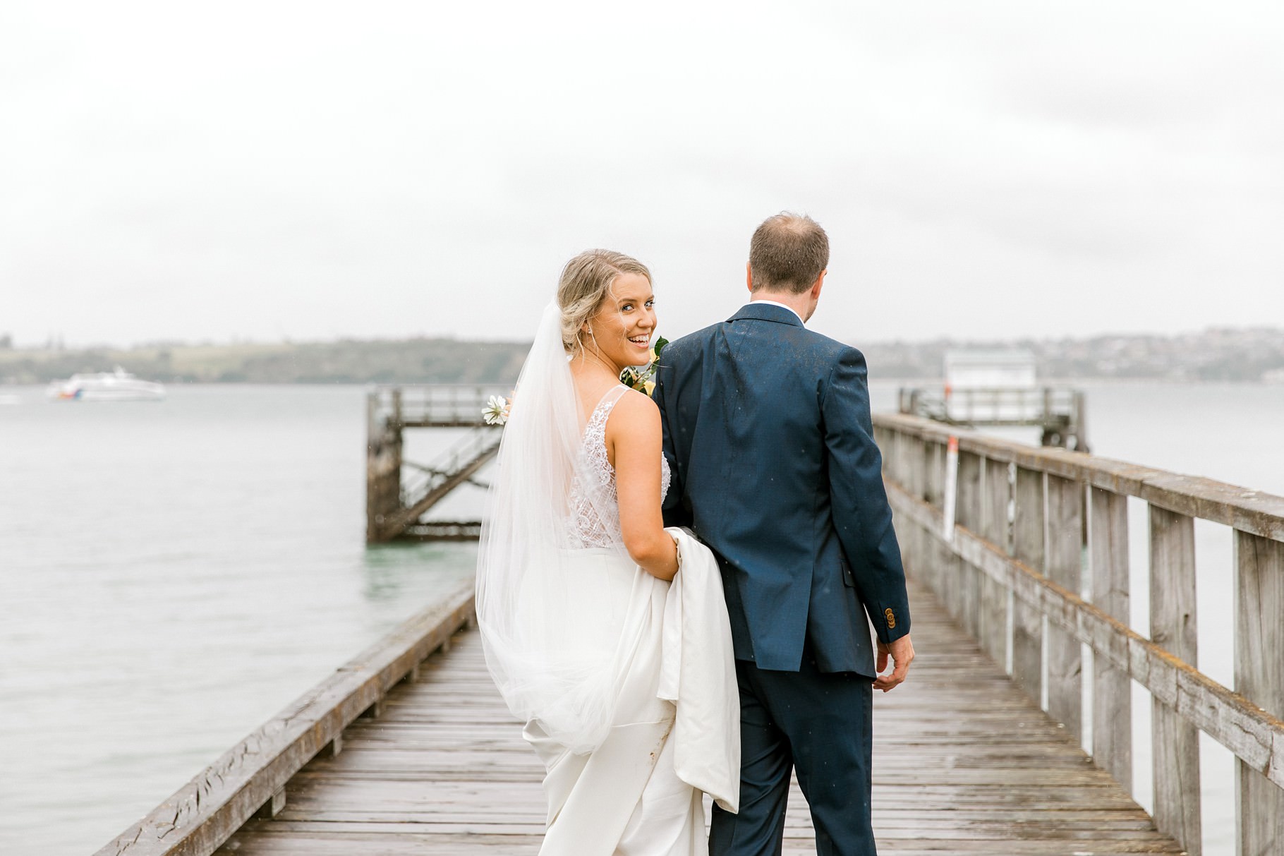 Auckland Wedding photographer, Officers Mess wedding photographer, Takapuna wedding photographer, Floral Stylist, Floral arch, blush bridesmaids dresses, rainy wedding